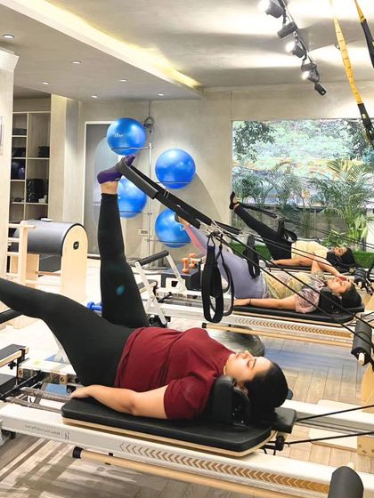 The 'feet in straps' series is a cornerstone of Reformer work, enhancing leg and core strength, stability, and flexibility all at once.