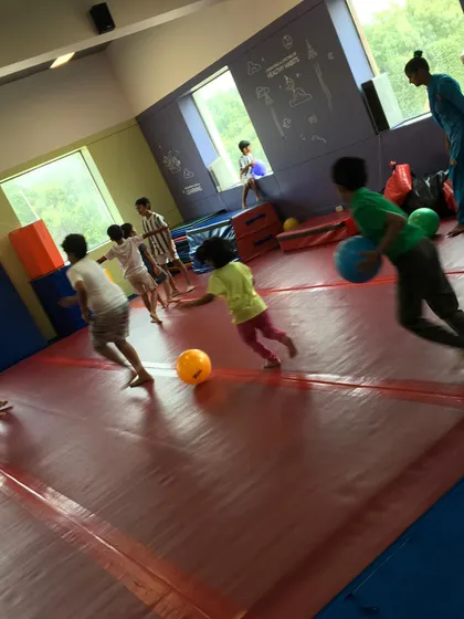 A high-energy game with balls gets everyone moving and laughing. These activities are perfect for developing agility and spatial awareness in a playful, social context.
