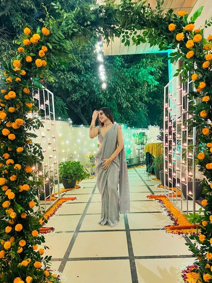 A simple grey saree I designed, perfect for an elegant evening look. Sometimes, a beautiful drape and a simple color are all you need.