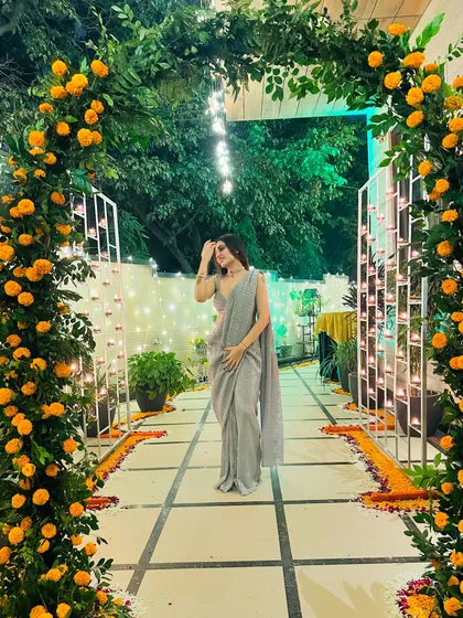 A simple grey saree I designed, perfect for an elegant evening look. Sometimes, a beautiful drape and a simple color are all you need.