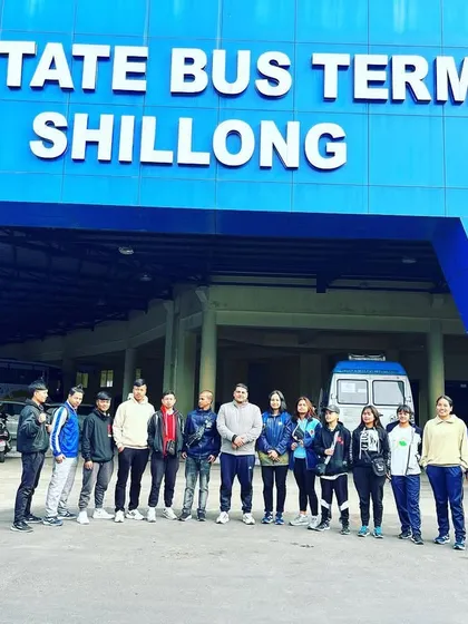 The team at the Shillong bus terminus, ready to travel for the All India Inter SAI Karate Championship. The journey to a competition starts long before we step on the mat.