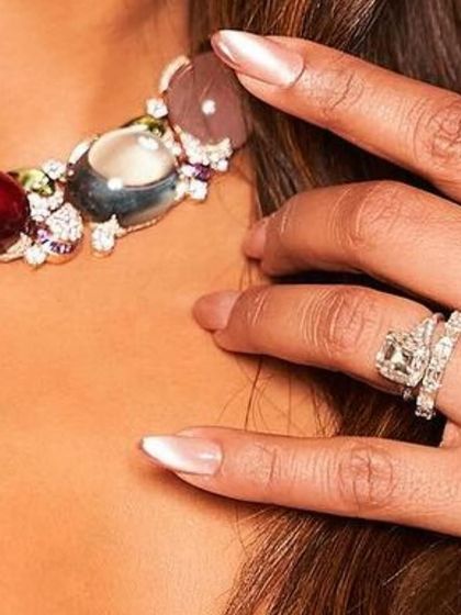 A close-up of the delicate, light-reflecting chrome nails I created for Priyanka Chopra. This showcases how a simple color with a unique finish can make a powerful statement, especially when paired with exquisite jewelry.