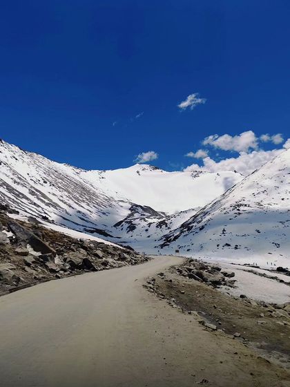 The raw beauty of Khardung La pass covered in snow. We ensure our trips are timed for the best possible conditions to witness scenes like this.