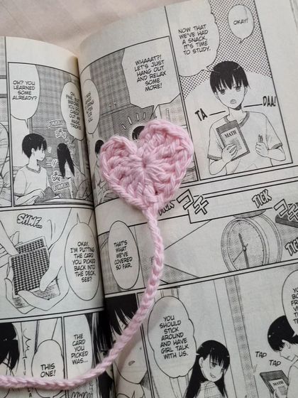 For the manga and anime fans, our simple heart bookmark is a sweet accessory. This one is pictured in a volume of "I Want to Eat Your Pancreas."