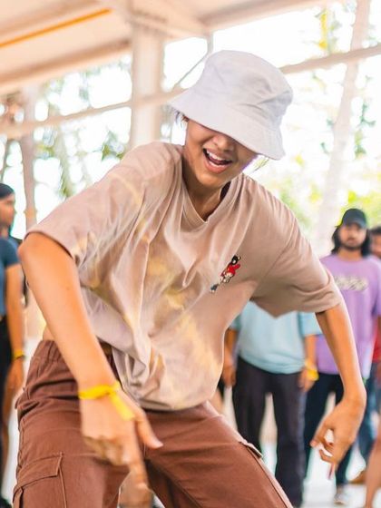 A dancer shows off his footwork and personality during the Spectra battles.