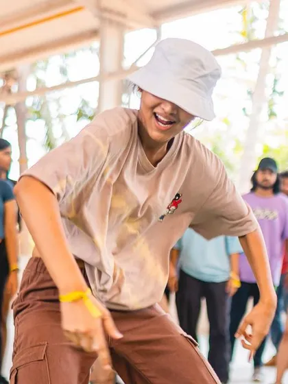 A dancer shows off his footwork and personality during the Spectra battles.