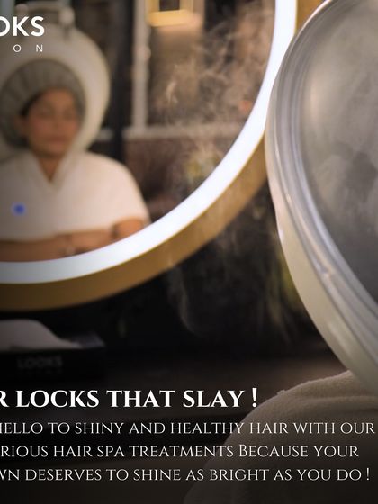 An image highlighting our luxurious hair spa treatments, essential for pre-bridal care. A client is seen relaxing under a hair steamer, ensuring her hair is shiny and healthy.