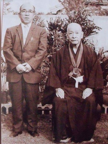 A historical photograph of Sensei Choshin Chibana and Sensei Zenryo Shimabukuro, the founder of Seibukan. Our practice is built upon the legacy of these great masters.