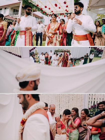The bride's grand entrance and the emotional moment of the first look during the antarpat ritual, surrounded by smiling family.