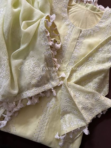 A close-up of the kurta's yoke and the corner of the dupatta.