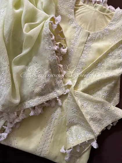 A close-up of the kurta's yoke and the corner of the dupatta.