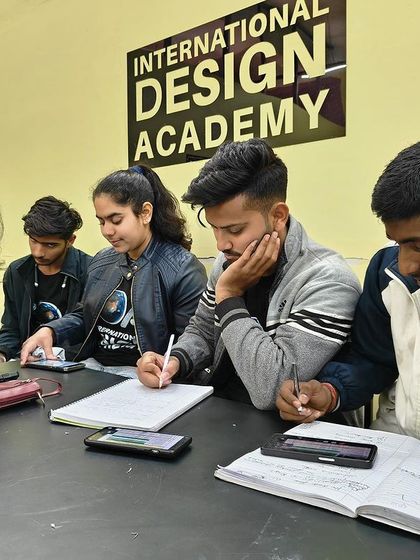 A focused group of students during a hands-on segment of the workshop. You can see the concentration as they apply the concepts we've just covered.