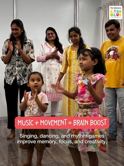 Music plus movement equals a brain boost. Singing, dancing, and rhythm games are proven to improve a child's memory, focus, and creativity. Here, children and parents enjoy a clapping game together.