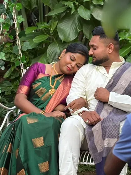 A quiet, tender moment captured during the shoot. Her traditional look is complete with flawless makeup and hair, making her look absolutely serene.