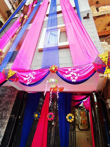 A full view of the pink and blue house decoration, demonstrating a bold and beautiful colour choice for a wedding home.