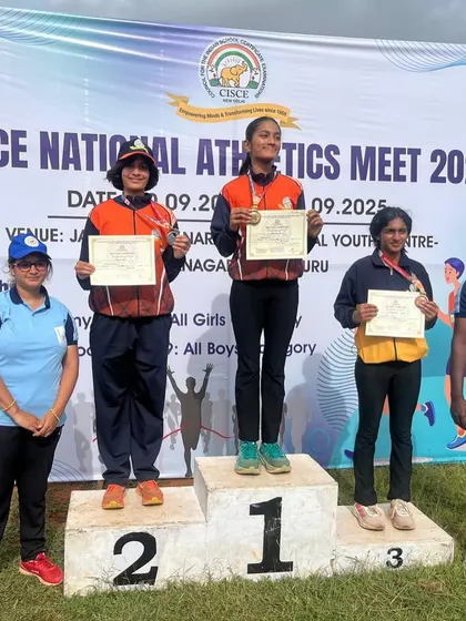 This is what we strive for. Our athlete, Keona Asher, on the national podium after years of dedication. We don't just build runners; we build champions.