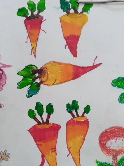 A study of radishes by Areez, a 3rd standard student. Using oil pastels, he has learned to blend colors to show the shape and texture of the vegetables.