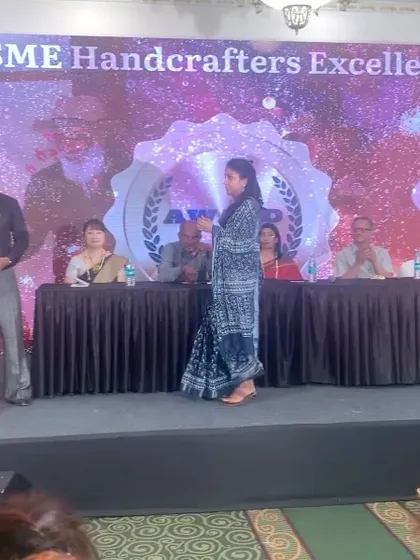 A candid shot from the awards ceremony. Moments like these are a celebration of the hard work and passion that goes into building something from the ground up.
