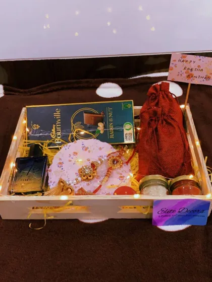 A full view of the classic Rakhi hamper for a brother, complete with a handwritten note. Every detail is arranged to create a warm and heartfelt gift.