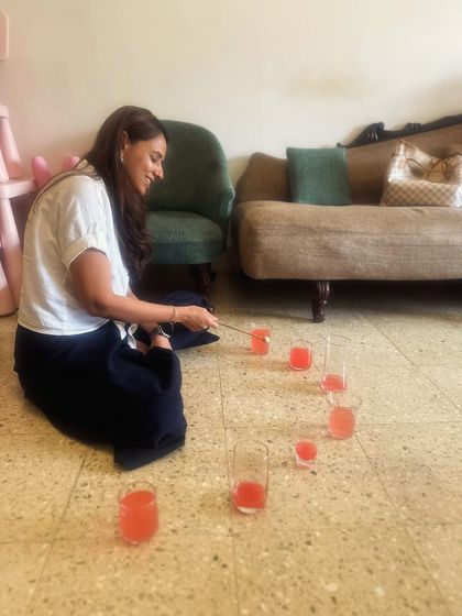 A peek behind the scenes of our curriculum planning. Here, one of our founders experiments with a 'jal tarang' (musical water glasses), exploring how to create simple, sound-based lesson plans for our classes.
