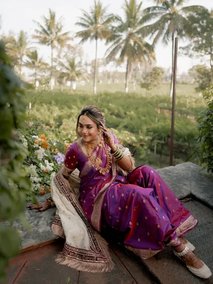 A serene portrait of our Marathi bride. The entire look, from the saree to the makeup, is designed to be majestic and timeless.