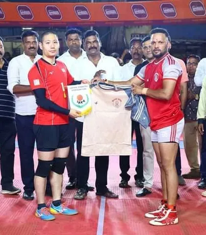 Our captain exchanging a memento and jersey with the captain of the Japan team.