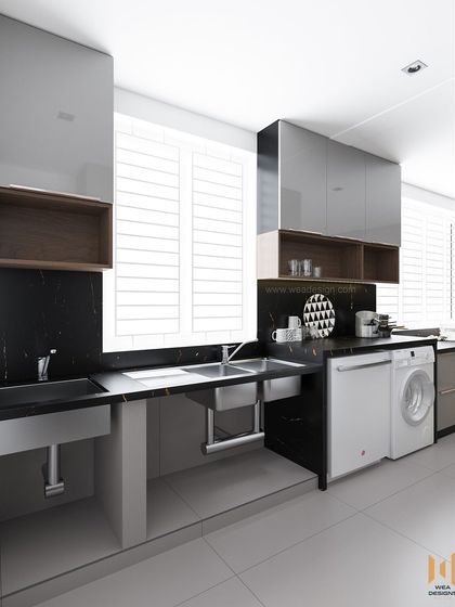 The utility area of the luxury kitchen, with dedicated space and plumbing for a washing machine and an additional sink.