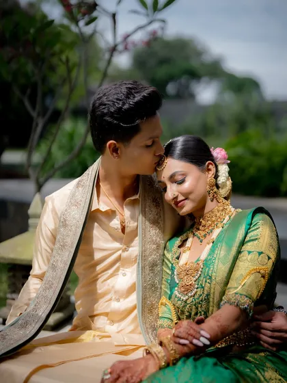 Creating a cohesive look for the couple is essential. Here, the bride's traditional elegance is perfectly matched by the groom's subtle, clean makeup, ensuring they both look their absolute best for their wedding portraits.
