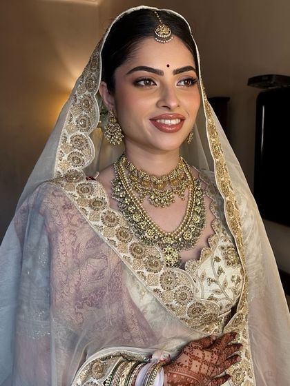A radiant, smiling portrait of Sanya. This is the ultimate goal: a bride who feels happy, comfortable, and beautiful.