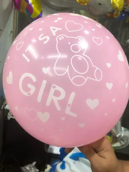 Our "It's a Girl" printed latex balloon in soft pink. This is a great addition to balloon bouquets or for filling a room to announce the arrival of a baby girl.