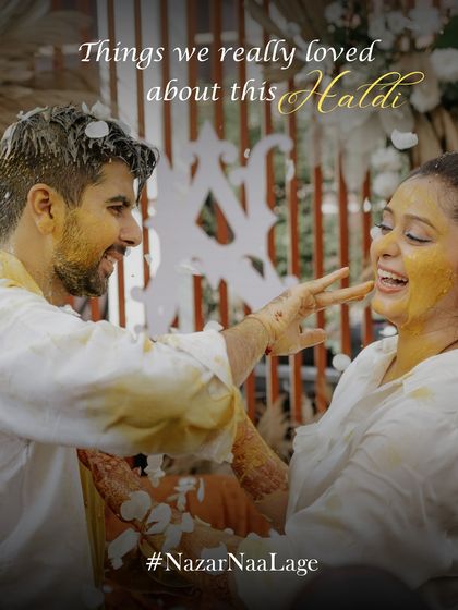 The quintessential Haldi moment. A candid shot of the couple sharing a laugh as they playfully apply turmeric paste, surrounded by the beautiful boho decor we designed.