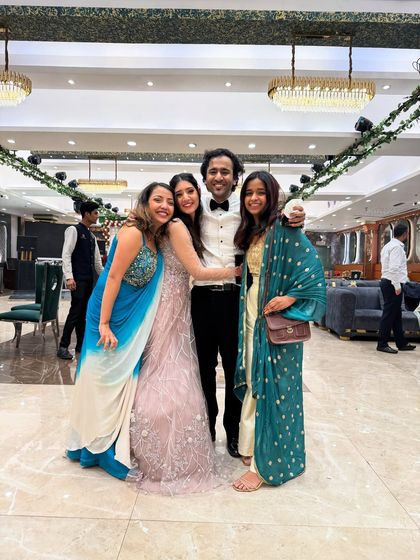 A happy hug with our friends who turned into clients. We love being a part of their journey and can't wait for their big day.