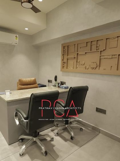 A private cabin featuring the 3D architectural floor plan mural, creating a sophisticated and on-brand backdrop.