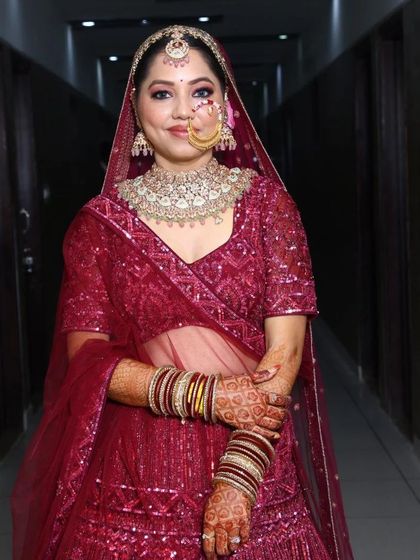 The complete look of our magenta sequin rental lehenga. It offers a modern, shimmering alternative to traditional bridal wear, ensuring you stand out.