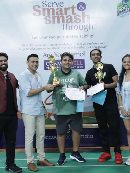 It's a great feeling to award the champions. Here I am with some of the winners from the Pernod Ricard India event. I am present on the ground to manage the flow, keep the energy high, and celebrate every participant's effort.