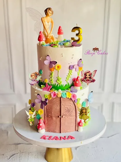 A sprinkle of magic and a dash of dreams. This enchanted fairy garden cake features a fairy door, tiny mushrooms, and whimsical fairy toppers, perfect for a magical birthday.