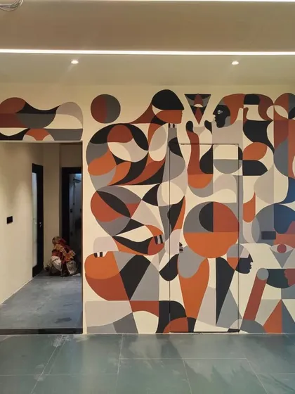 The full view of the geometric mural, demonstrating how it can transform a simple hallway into an art experience.