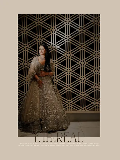 A stunning solo portrait of the bride-to-be against a modern, geometric backdrop, highlighting her beautiful lehenga.