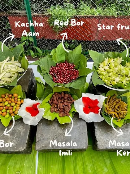 My 'Back to School' or 'Bachpan ki Yaadein' counter is a unique and nostalgic addition to any event. This annotated image shows the variety of tangy and sweet treats from childhood that I offer.
