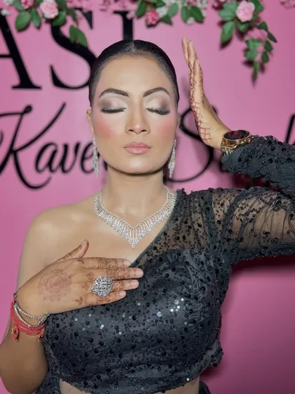 A close-up of the soft glam makeup, with shimmery eyes and a nude lip.
