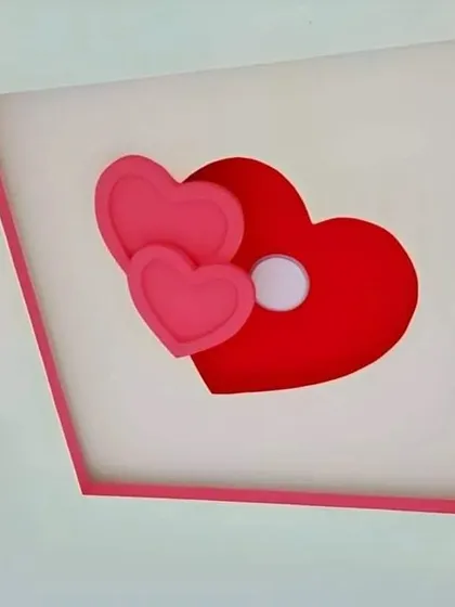 A simple and sweet design for a nursery or child's room. This ceiling features a layered heart motif in pink and red, creating a lovely focal point.