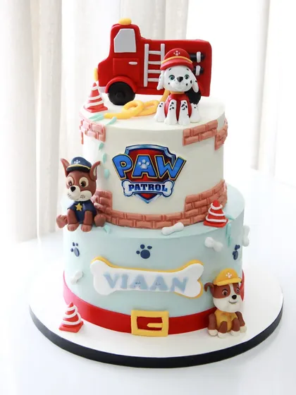 No job is too big, no pup is too small! This two-tiered Paw Patrol cake was a joy to create for Viaan's birthday, featuring Marshall, Chase, and Rubble ready for action.