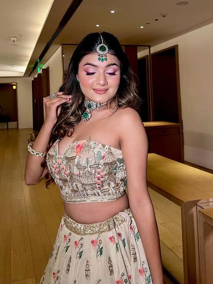 A beautiful candid shot of this haldi look, showing the soft, blended eye makeup.