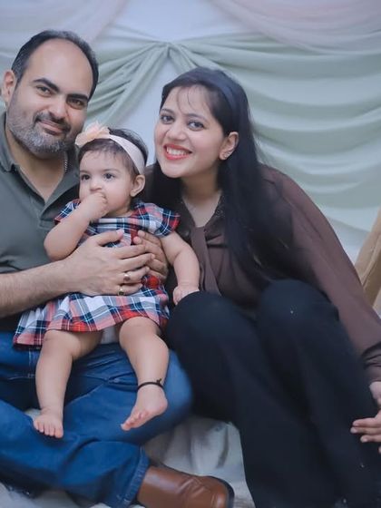 A full family portrait in our boho-themed studio setup, complete with a mini tent and soft fabrics.