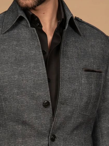 A close-up of my summer shacket in a grey textured fabric. This shirt-jacket hybrid is a versatile layering piece for a casual-chic look.
