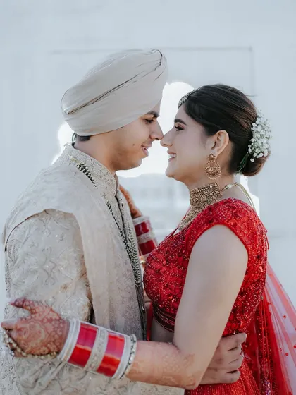 An intimate glance that says more than words ever could. We direct our couples into comfortable, natural poses that allow their genuine connection to be the focus, creating authentic and romantic portraits.