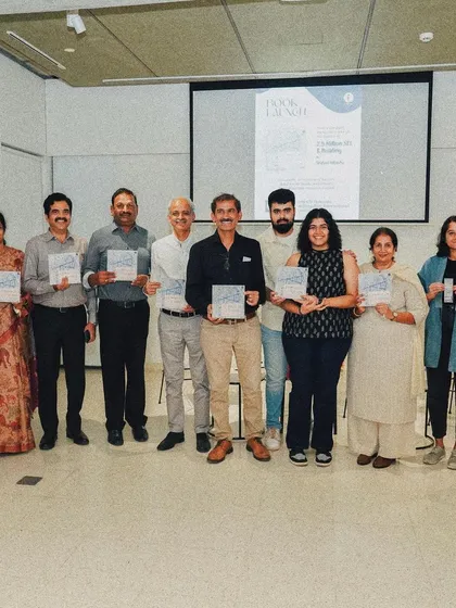 A group photograph with key figures from the architectural community who came to support the launch of our firm's documented history.