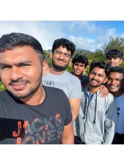 A group selfie capturing the fun and camaraderie of our Nandi Hills bike trip and trek.