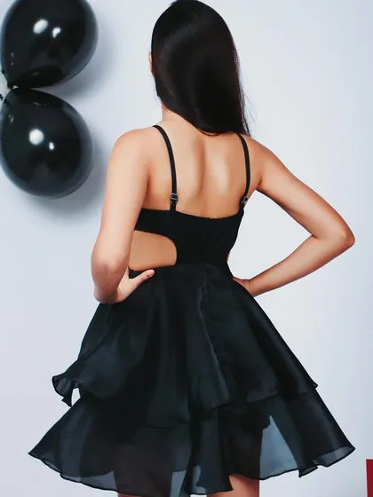 Another angle of the back of the dress, showing the full silhouette.