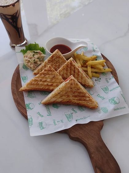 This platter combines our delicious grilled sandwiches with a rich and creamy chocolate milkshake. It's a perfect combo for birthday parties, house parties, or any relaxed get-together.